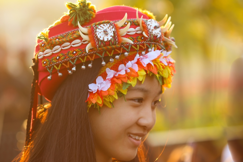 Diaspora heritage as an Asian young lady wearing her traditional costume