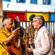 Cuban musician talking to a foreigner