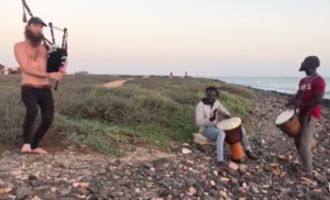 bagpipe artist playing with locals in Cape Verde