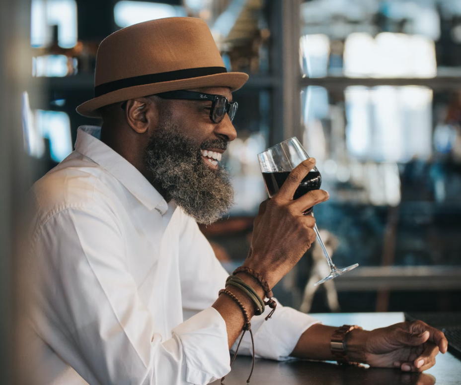 man having a glass of wine